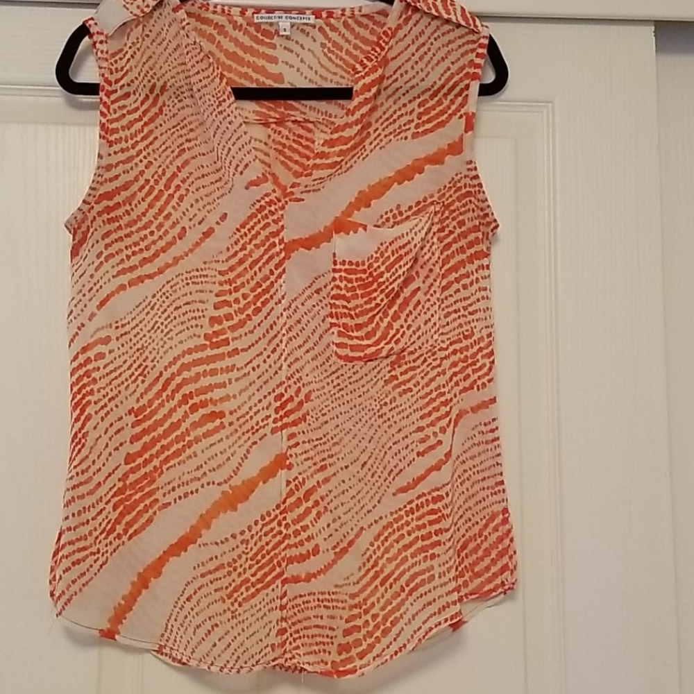 Sheer orange and creme top
